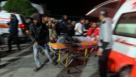 Palestinians wounded in the Israeli bombardment of the Gaza Strip are brought to Al Aqsa hospital in Deir al Balah, Gaza Strip, Monday, March 25, 2024.