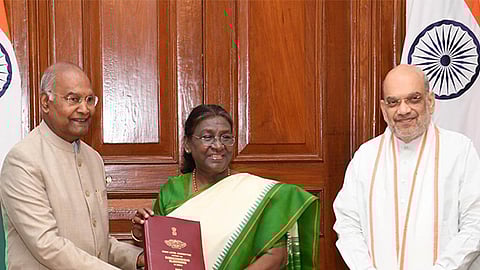 Ex-President Ramnath Kovind submitting the One Nation One Election committee report to President Murmu. Home Minister Amit Shah can also be seen. 