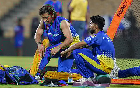  Chennai Super Kings (CSK) captain Ruturaj Gaikwad with teammate MS Dhoni during a training session ahead of the Indian Premier League (IPL) 2024 cricket match between Chennai Super Kings and Royal Challengers Bengaluru, at MA Chidambaram Stadium, in Chennai, Thursday, March 21, 2024.