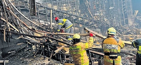  Rescuers clear charred wreckage inside Moscow’s Crocus City Hall on Saturday