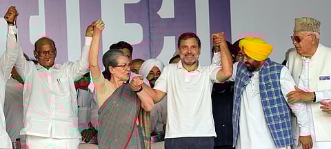 Congress President Mallikarjun Kharge, NCP chief Sharad Pawar, Congress leaders Sonia Gandhi, Rahul Gandhi, AAP leader and Punjab Chief Minister Bhagwant Mann and J&K NC chief Farooq Abdulla join hands during I.N.D.I.A. bloc's 'Loktantra Bachao Rally' at Ramleela Maidan, in New Delhi, Sunday, March 31, 2024.