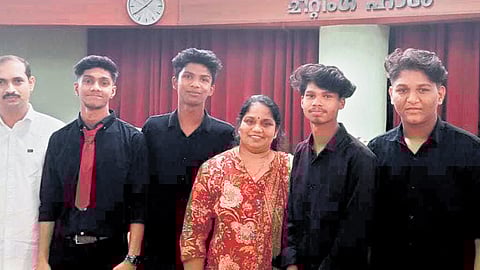 Team members of Thozhil portal with their teacher Sapin and Samagra Shiksha Keralam district programme officer V T Sheeba