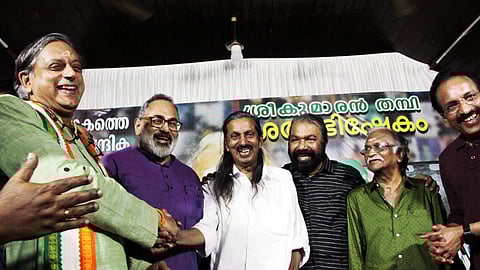 UDF, BJP and LDF candidates, Shashi Tharoor, Rajeev Chandrasekhar and Pannyan Raveendran are all smiles at the 84th birthday celebrations of lyricist Sreekumaran Thampi held at Sreechitra Poor Home in Thiruvananthapuram on Saturday. Labour Minister V Sivankutty, Sreekumaran Thampi and ISRO chairman S Somanath are also seen.