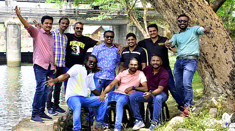 Members of the original Manjummel Boys. Back row: Sujith U S, Abhilash John, Siju John, Anil Joseph, Krishnakumar M, Sumesh U S, Sixon John. Front row: Subash Chandran, Siju David (Kuttan), Prasad P S  