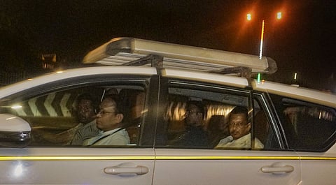 Delhi Chief Minister Arvind Kejriwal being taken away from his residence after he was arrested by the Enforcement Directorate on March 21 night.