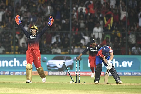 Richa Ghosh (wicketkeeper) in action against Delhi Capitals at M Chinnaswamy Stadium, Bengaluru 
(Photo | Vinod Kumar T, EPS) 