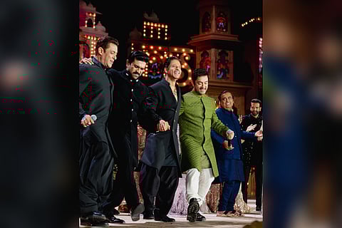 Ram Charan with Shah Rukh Khan, Salman, and Aamir performing the hook step of the Ram Charan and NTR Jr starrer 'RRR' song 'Naatu Naatu' at the pre-wedding festivities of Anant Ambani and Radhika Merchant in Jamnagar.