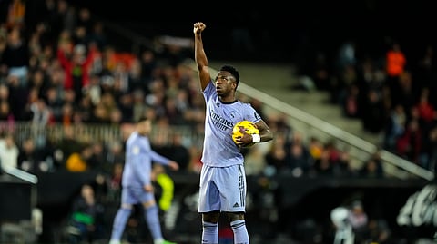 Brazil's Vinicius Junior celebrates after scoring his side's first goal during the La Liga soccer match between Valencia and Real Madrid at the Mestalla Stadium in Valencia, Spain, Saturday, March 2, 2024.