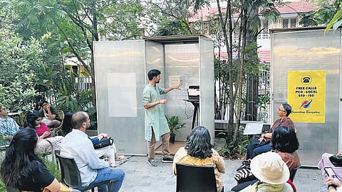 Anmol Tikoo explains his art installation, Listening to Voices, at Bangalore International Centre 
