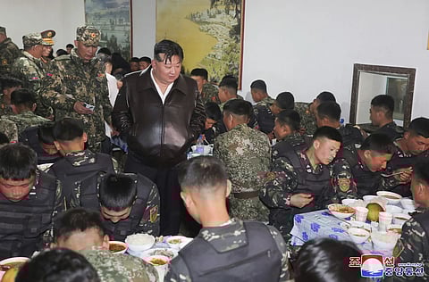 North Korean leader Kim Jong Un, center, visits canteen during his visit to the Seoul Ryu Kyong Ku Su Guards 105th Tank Division in North Korea on March 24, 2024.