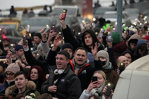 People walk toward the Borisovskoye Cemetery for the funeral ceremony of Russian opposition leader Alexei Navalny, in Moscow, Russia, Friday, March 1, 2024.