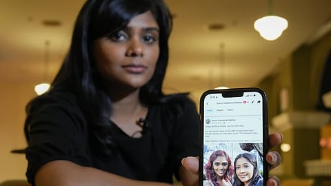 Grace Subathirai Nathan, showing a picture of her mother on her cellphone during an interview with The Associated Press in Kuala Lumpur, Malaysia, Monday, Feb. 26, 2024.