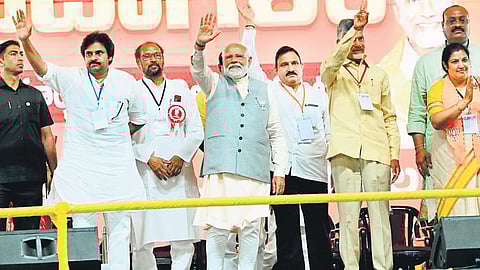 Prime Minister Narendra Modi, TDP supremo N Chandrababu Naidu and Jana Sena chief Pawan Kalyan greet people at the Praja Galam meeting at Boppudi in Palnadu district on Sunday.