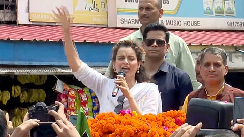 BJP candidate actor Kangana Ranaut during a roadshow ahead of Lok Sabha elections, in Mandi.