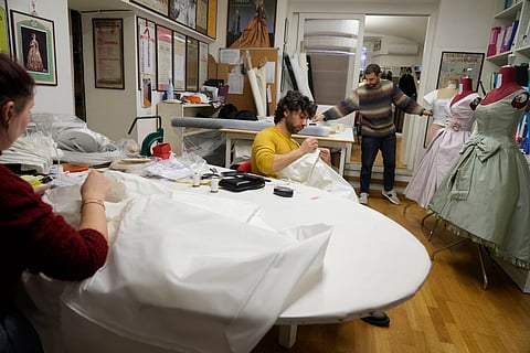 Dressmakers work at the Tirelli Atelier in Rome, Tuesday, March 5, 2024. 