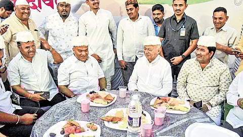 Congress leader and former Maharashtra CM Sushil Kumar Shinde and others at an Iftar party during Ramzan in Solapur on Friday. 