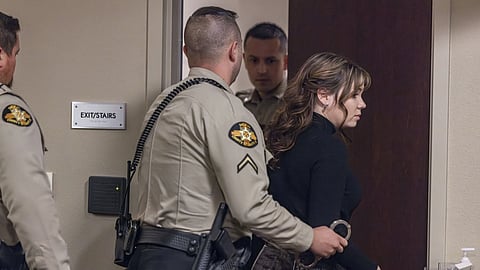 Hannah Gutierrez-Reed looks over at her mom Stacy Reed as she is taken into custody after the guilty verdict during her trial at district court on March 6, 2024. 