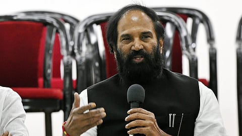 Minister Uttam Kumar Reddy speaks to the media.