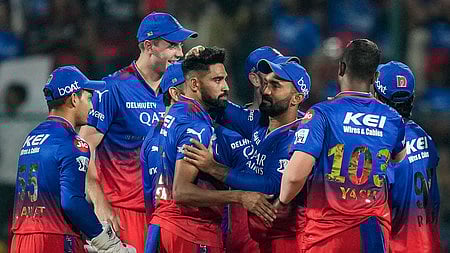 Royal Challengers Bengaluru Mohammed Siraj celebrates with teammates