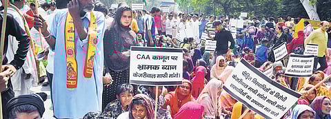 Pakistani Hindu refugees protest against Chief Minister Arvind Kejriwal’s statemanet on implementation of the Citizenship (Amendment) Act on Thursday | express