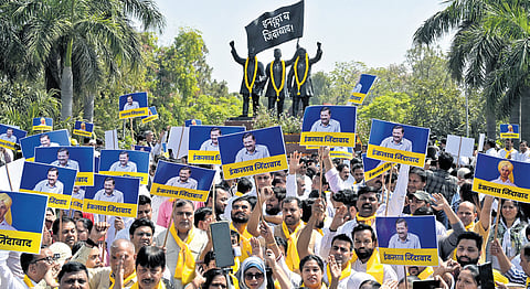 AAP workers at Shaheedi Park during a protest against CM Arvind Kejriwal’s arrest in New Delhi on Saturday