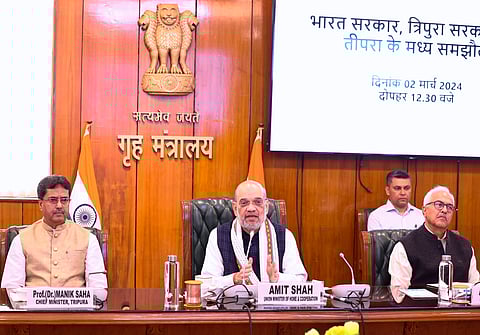 Union Home Minister Amit Shah with Tripura Chief Minister Manik Saha during the signing of the agreement (Photo | PTI)