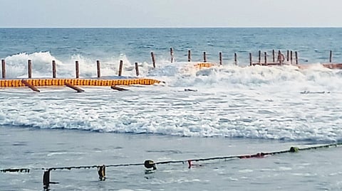 The damaged floating bridge at the Papanasam beach in Varkala