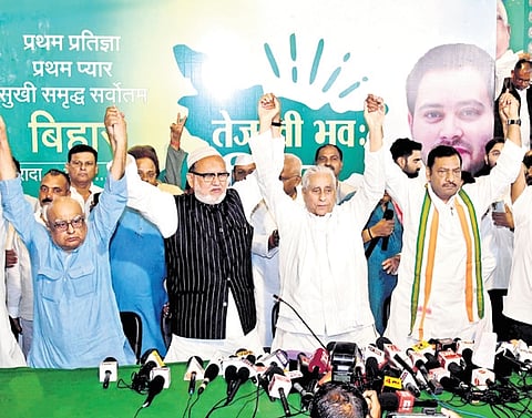 Bihar RJD chief Jagdanand Singh and state Congress chief Akhilesh Singh join hands with CPI-ML, CPM and other leaders on Friday 