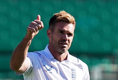 England's James Anderson gestures after taking the wicket of India's Kuldeep Yadav during the 3rd day of the fifth Test cricket match between India and England on March 9, 2024.
