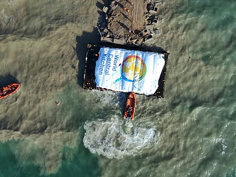 The second vessel, left, with food aid from aid group World Central Kitchen prepares to depart for Gaza, at Larnaca port, Cyprus. 