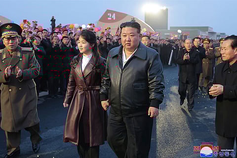 North Korean leader Kim Jong Un, and his daughter attend a completion and operation ceremony of Kangdong Greenhouse Farm in Pyongyang, North Korea Friday, March 15, 2024.