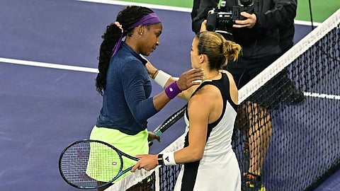USA's Coco Gauff (L) and Greece's Maria Sakkari meet at the net after their ATP-WTA Indian Wells Masters women's semi-final tennis match at the Indian Wells Tennis Garden in Indian Wells, California, on March 15, 2024.