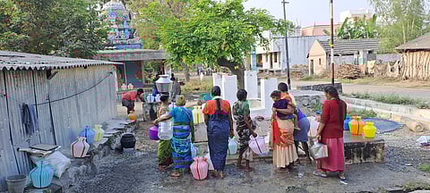 People fetching water from a public tap at Perali in Perambalur district