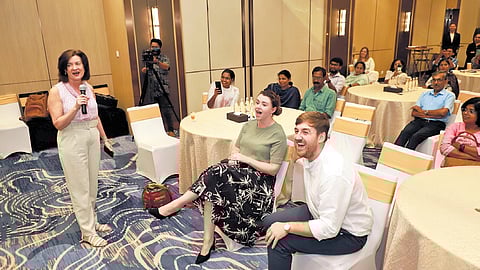Welsh Health and Social Services Minister Eluned Morgan singing at the interaction programme in Thiruvananthapuram on Saturday