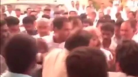 Villagers 'gherao' Congress leader and CM Siddaramaiah's son Yathindra Siddaramaiah at Muddubeeranahundi village in Mysuru demanding the completion of various developmental works.