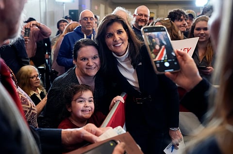 Republican presidential candidate former UN Ambassador Nikki Haley poses for a selfie after speaking at a campaign event in South Burlington, Vermont, Sunday, March 3, 2024.
