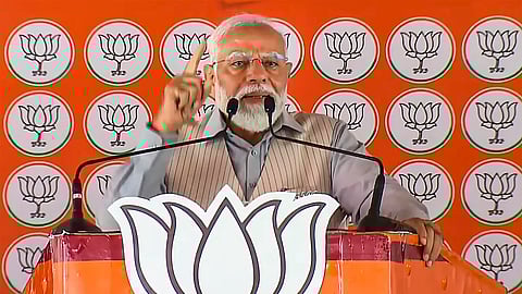 Prime Minister Narendra Modi speaks during a public meeting, ahead of Lok Sabha elections, in Saharanpur, Saturday, April 6, 2024. 