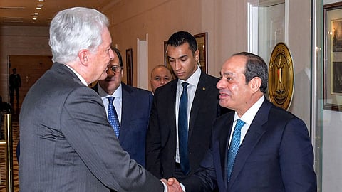 This handout picture released by the Egyptian Presidency shows Egypt's President Abdel Fattah al-Sisi (R) meeting with CIA Director William Burns at the presidential palace in Cairo on April 7, 2024. 