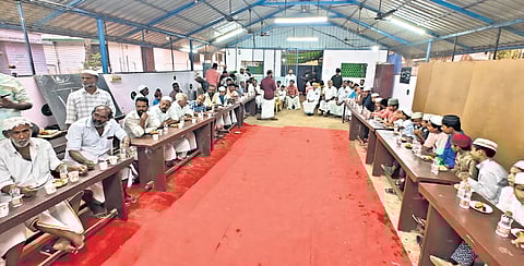 People participating in the Iftar held at the madrasa hall at Rifaee Sunni Juma Masjid at Pappaly near Mannanchery