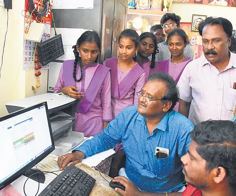 Students gathered at schools to check their Class X examination results in Tirupati on Monday I Madhav K