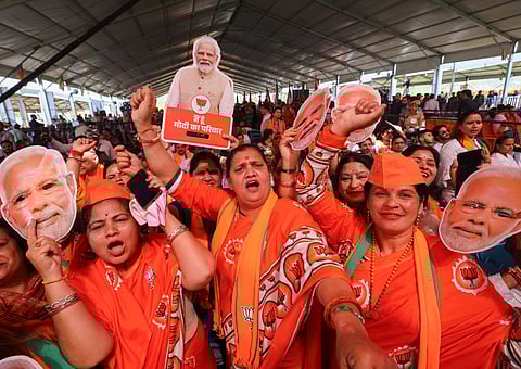  BJP supporters during a public meeting to be addressed by Prime Minister Narendra Modi, ahead of the upcoming Lok Sabha election, in Udhampur, Friday, April 12, 2024. 