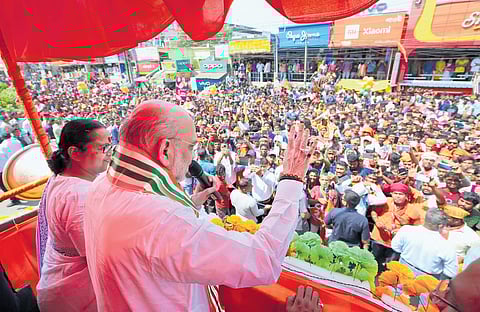 Amit Shah addresses an election campaign rally in Raiganj, West Bengal.