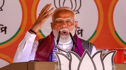 Prime Minister Narendra Modi addresses a public meeting for Lok Sabha elections, in Malda district, Friday, April 26, 2024.