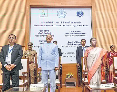 President Droupadi Murmu with Maharashtra Governor Ramesh Bais and IIT Bombay Director Subhasis Chaudhuri during the launch of CAR-T cell therapy in Mumbai.