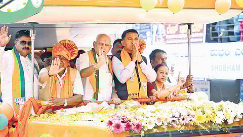 BJP candidate Jagadish Shettar, former CM BS Yediyurappa, Goa CM Pramod Sawant, former minister Balachandra Jarkiholi, sitting MP Mangala Angadi and MLA Abhay Patil take part in the rally in Belagavi on Wednesday 