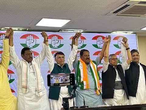 Former BJP MP Ajay Nishad with Congress leaders Pawan Khera, Mohan Prakash and Akhilesh Prasad Singh. 