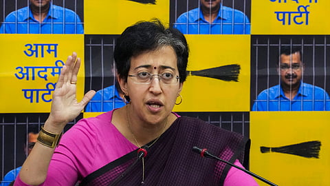Delhi Minister and Aam Aadmi Party (AAP) leader Atishi addresses a press conference, in New Delhi.