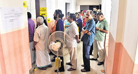 A pedestal fan kept at Booth 82 at St Augustine’s LP School in Kaloor for voters who turned up to cast votes in the second phase of Lok Sabha elections on Friday. 