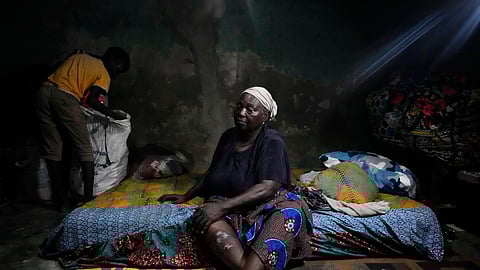 Funmilayo Kotun, 66-years-old, a malaria patient is photographed in her one room in Makoko neighbourhood of Lagos, Nigeria, Saturday, April 20, 2024.