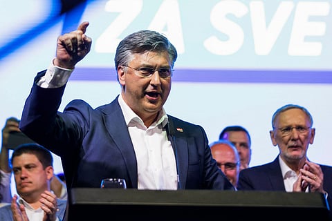 Croatia's Prime Minister and President of Croatian Democratic Union (HDZ) party, Andrej Plenkovic gestures during a rally in Zagreb on April 14, 2024.
